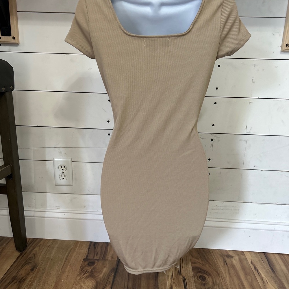 Beige almost famous body on dress small. New without tags.